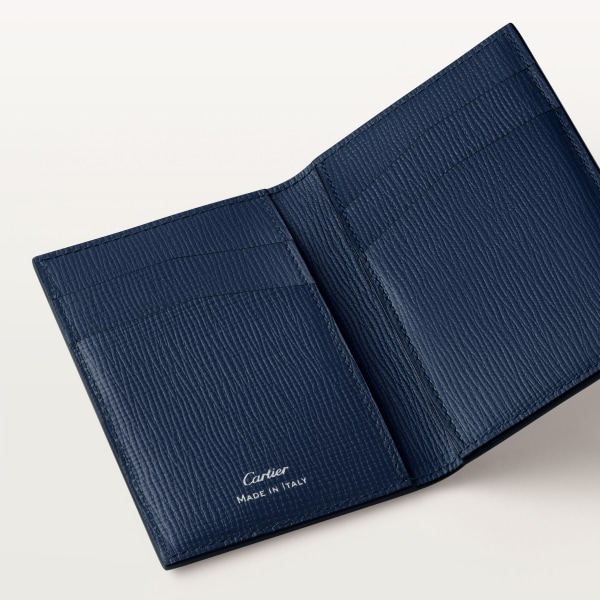 Four-credit card holder, Cartier Losange Navy blue grained calfskin with diamond-shaped motif print, palladium finish and enamel.
